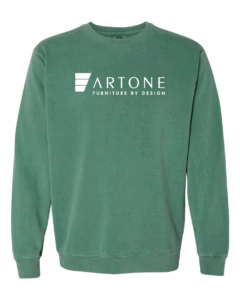 Product mockup of a light green Comfort Colors 1566 crewneck sweatshirt with a large 'Artone Furniture by Design' logo on the center chest.
