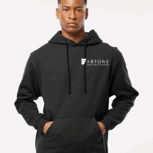 Male model wearing a custom black Tultex 320 pullover hoodie with the white 'Artone Furniture by Design' logo on the left chest.