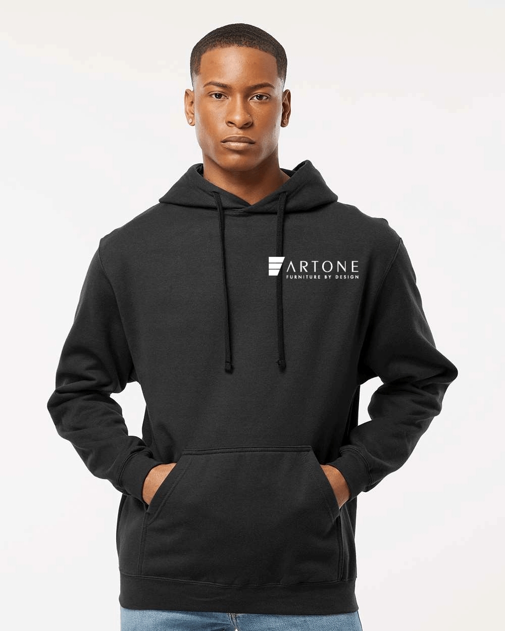 Tultex - Unisex Fleece Hooded Sweatshirt - 320 (Artone) 1 Male model wearing a custom black Tultex 320 pullover hoodie with the white 'Artone Furniture by Design' logo on the left chest.