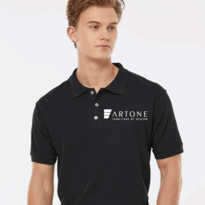 Male model showcasing a custom black Tultex 400 polo shirt with the 'Artone Furniture by Design' logo on the left chest.