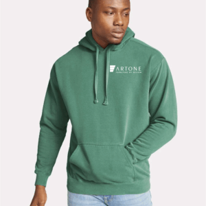 Male model wearing a custom light green Comfort Colors 1567 pullover hoodie with a large 'Artone Furniture by Design' logo on the left chest.